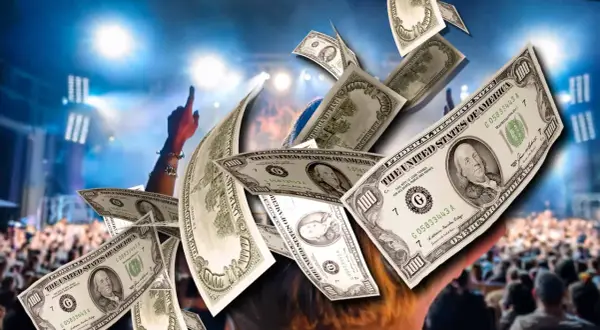 Geldregen über einem Konzertpublikum, das zeigt, wie man mit Musik Geld verdienen kann.