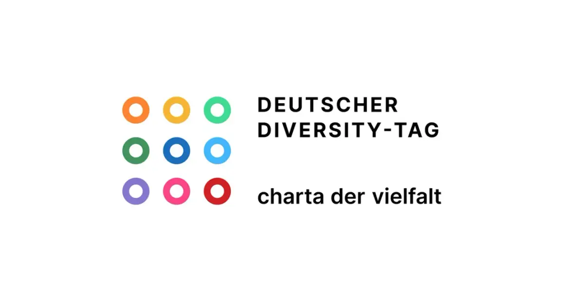 Logo des Deutschen Diversity-Tags mit bunten Kreisen und dem Schriftzug "charta der vielfalt".
